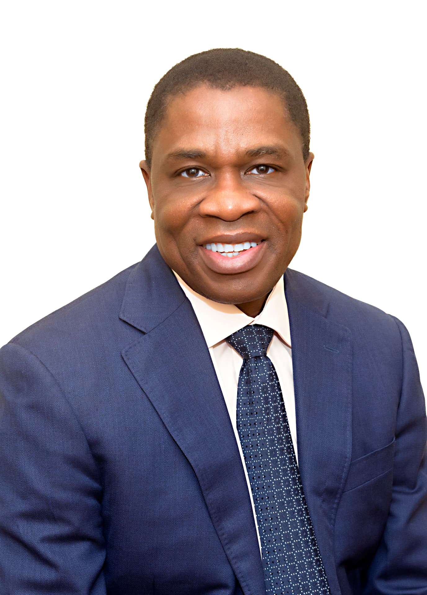 Dr. Henry Ukpeh in a blue suit